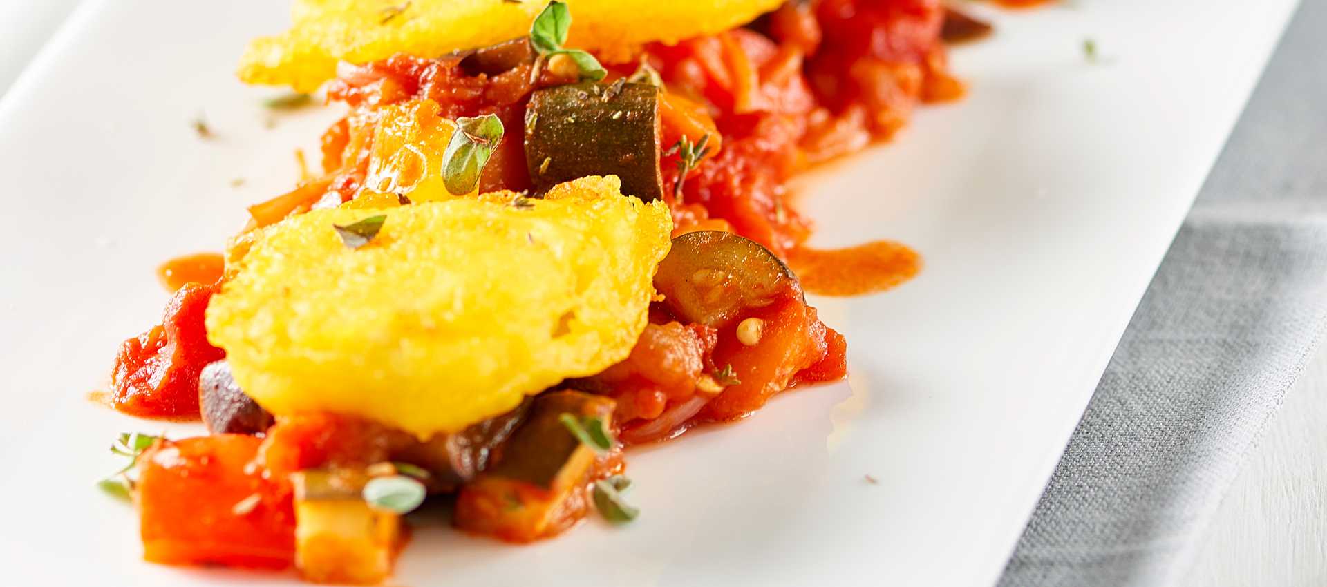 Stockfisch in Ausbackteig mit tomaten Stockfisch in Ausbackteig mit tomaten