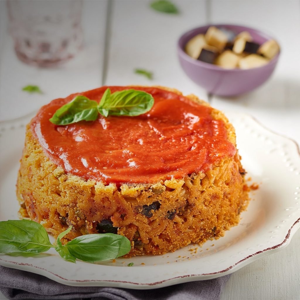 Timballo de pâtes à la tomate et aux petits pois Timballo de pâtes à la tomate et aux petits pois