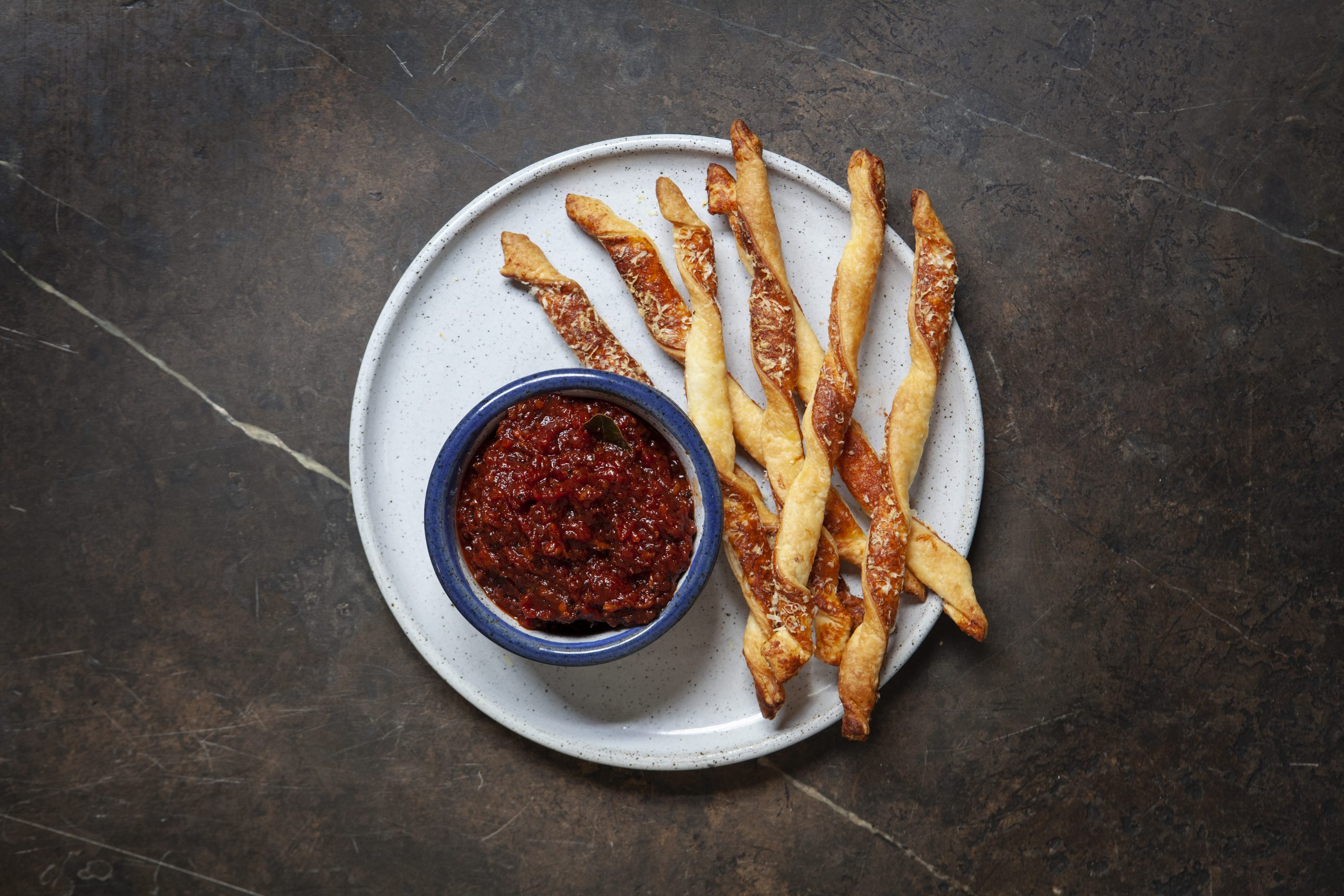 Tomato, pancetta and truffle jam with Parmesan puff pastry sticks Tomato, pancetta and truffle jam with Parmesan puff pastry sticks