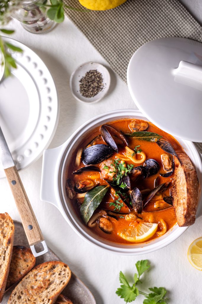 Seafood stew in rich tomato bisque with chargrilled sourdough Seafood stew in rich tomato bisque with chargrilled sourdough