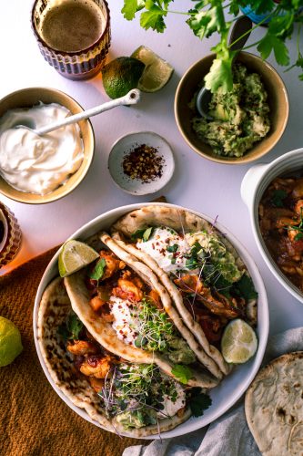 Chicken and Tomato Bake with Fajita Spices, served with sour cream, avocado and flatbreads Chicken and Tomato Bake with Fajita Spices, served with sour cream, avocado and flatbreads