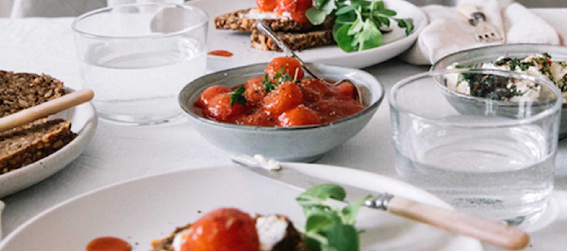 Mutti Cherry Tomatoes with Herbed Goats Cheese & Toast Mutti Cherry Tomatoes with Herbed Goats Cheese & Toast