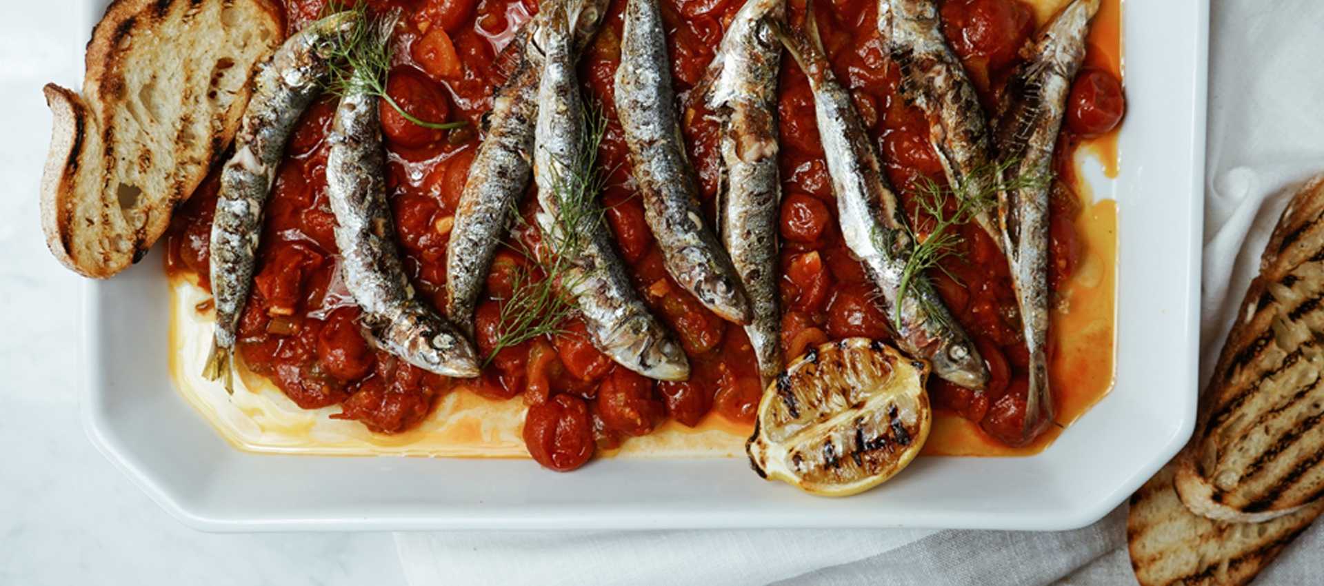 Crispy skinned sardines with Mutti Cherry Tomatoes and fennel Crispy skinned sardines with Mutti Cherry Tomatoes and fennel